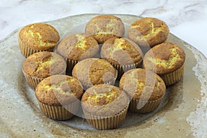 Lemon poppy seed muffins on plate