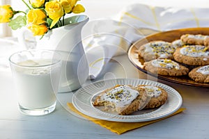 lemon poppyseed cookies served with fresh cold milk.