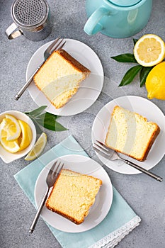 Lemon pound cake baked in a bundt pan topped with powdered sugar