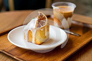 Lemon pound cake on white plate