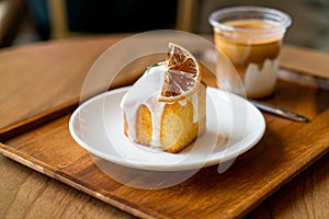 Lemon pound cake on white plate