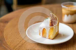 Lemon pound cake on white plate