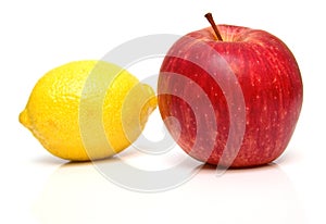 Lemon and red apple