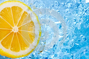 Lemon slice in blue water