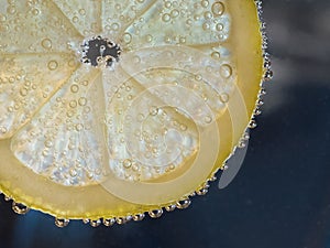 Lemon slice with bubbles