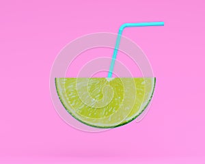 Lemon slice, juice with Straw on pastel pink background. minimal