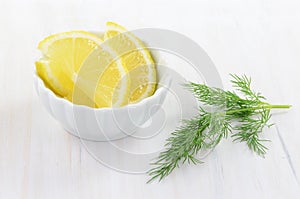 Lemon slices and dill
