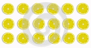 Lemon slices on a white background appear and disappear.Stop motion animation.