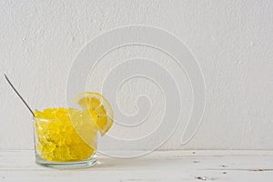 Lemon slushie on white wood