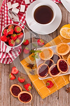 Lemon and straberry tartlets.