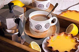 Lemon tarts and coffee