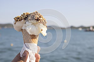 Lemon and vanilla ice cream. Close-up background of sea