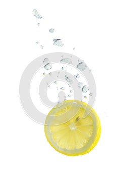 Lemon in water with air bubbles