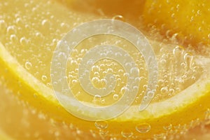 Lemon Wedges in Glass Mineral Water