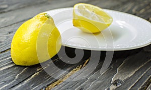 Lemon on white plate