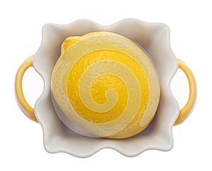 Lemon in a Yellow Cooking Dish