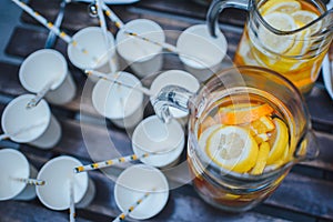 Lemonade in carafe and cups