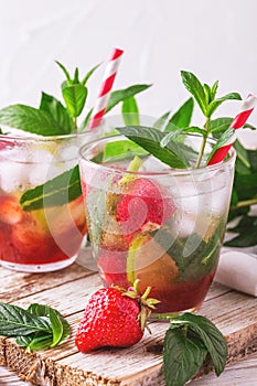 Lemonade with fresh strawberry, mint, lime and jam