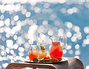 Lemonade and fruit on the beach