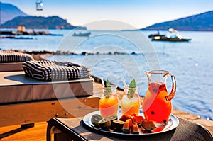 Lemonade and fruit on the beach