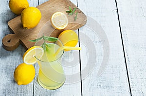 Lemonade in glass.Homemade Refreshment Summer cold drink with fresh lemons and mint