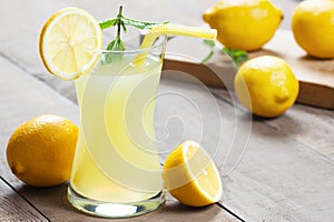 Lemonade in glass.Homemade Refreshment Summer cold drink with fresh lemons and mint