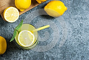 Lemonade in glass.Homemade Refreshment Summer cold drink with fresh lemons and mint
