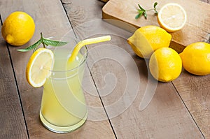 Lemonade in glass.Homemade Refreshment Summer cold drink with fresh lemons and mint