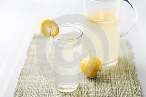 Lemonade glass and pitcher.