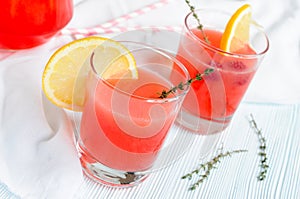 Lemonade in glasses, decorated with lemon ring