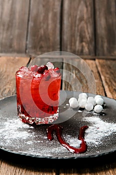 Lemonade or juice. Alcohol drink or cocktail. Images for bar or restaurant menu. Red drink with ice and berries