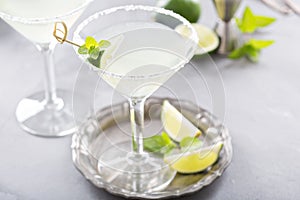 Lemonade martini cocktail garnished with lime