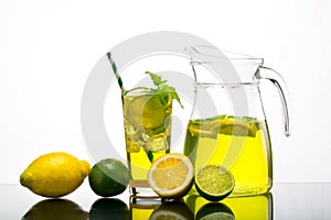 Lemonade pitcher with lemon