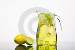 Lemonade pitcher with lemon