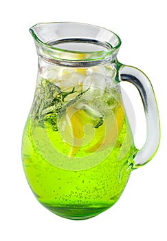 Lemonade with tarragon and ice in a glass jug on white isolated background