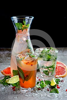 Lemonades with mint, berries and citrus