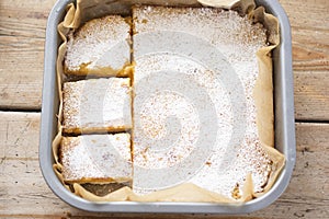 Lemond curd cake  squares with icing sugar