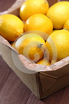 Lemons in box - close-up