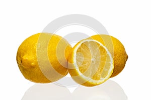 Lemons and half-lemon on a white background. Isolate on white.
