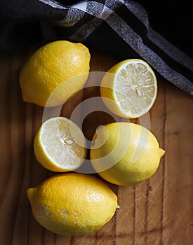 Lemons on light cutting board