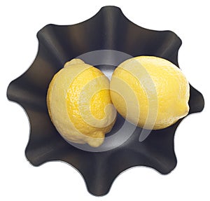 Lemons in a Modern Metal Bowl