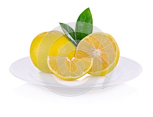 Lemons on plate  isolated on white background
