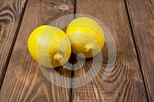 Lemons on a wooden background