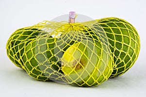 lemons in yellow net