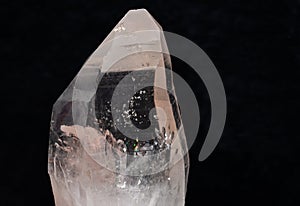 Lemurian Quartz crystal Point from Brazil isolated on a black background