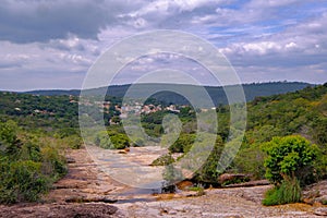 Lencois river with the Serrano pools and the city in the background, Lencois, Chapada Diamantina, Bahia, Brazil