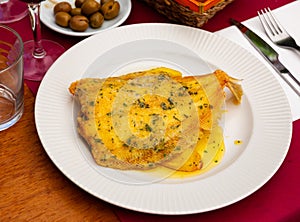 Lenguado meuniere in lemon sauce. French cuisine photo
