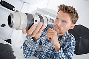 lens camera technician solving problem