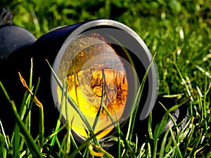 Lens telescope in grass