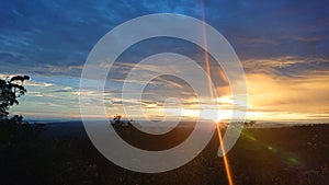 Lensflare on a sunset lanscape photo